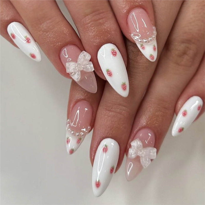Decorative Stiletto Press-On Nail Art with Floral Accents Bowlift