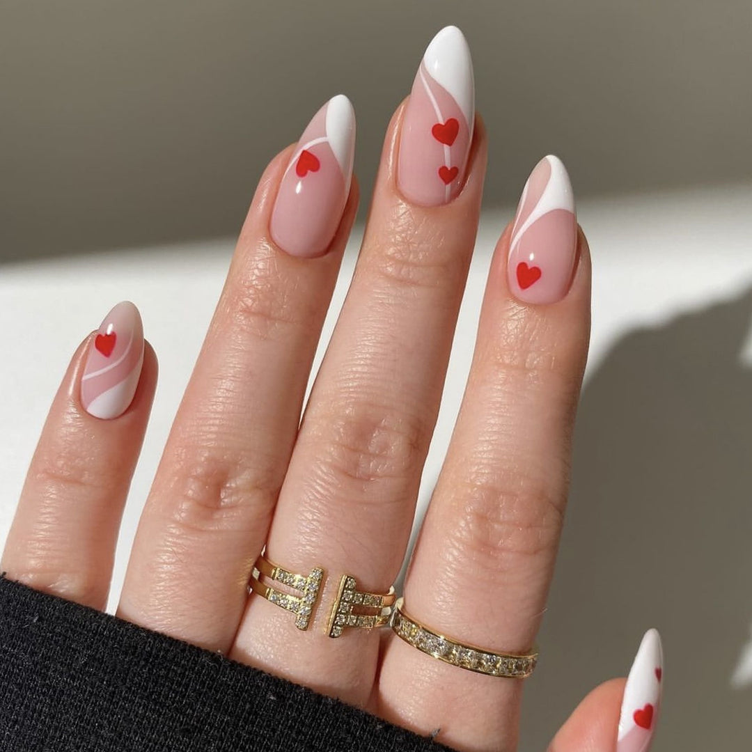 Heart-Embellished Stiletto Nail Art Bowlift