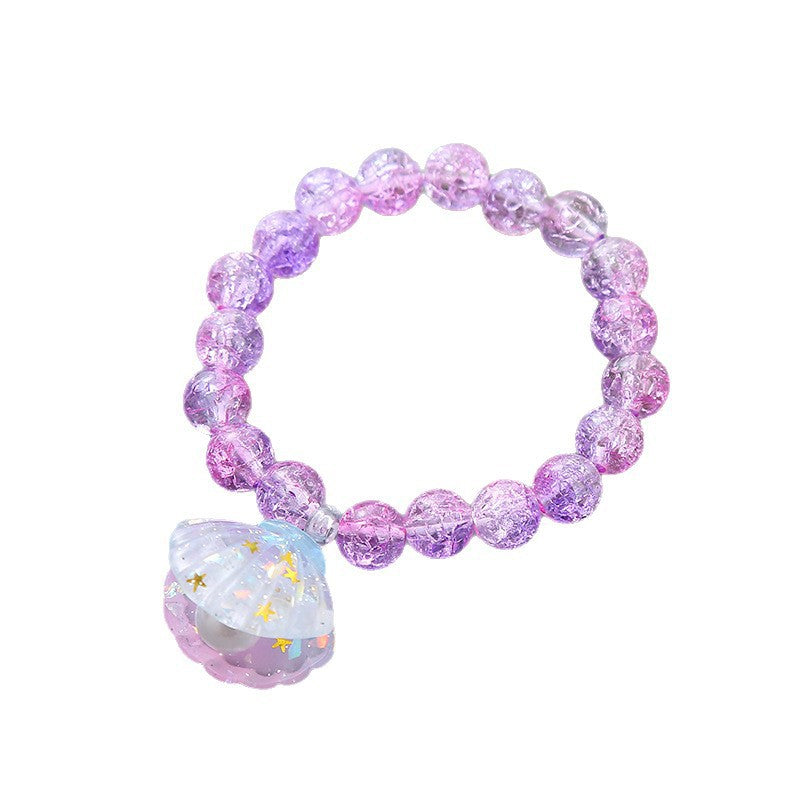 Playful bracelet with shell pendant Bowlift