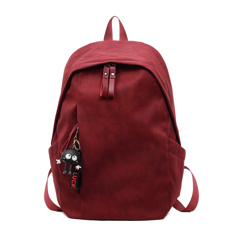 Fashionable backpack with practical design and decorative pendant Bowlift