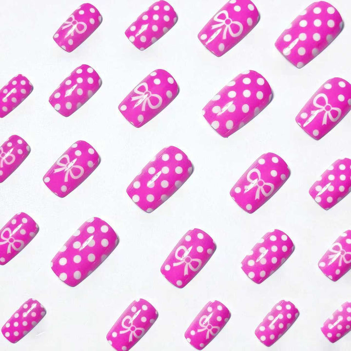 Stylish Polka Dot and Bow Nail Art Bowlift