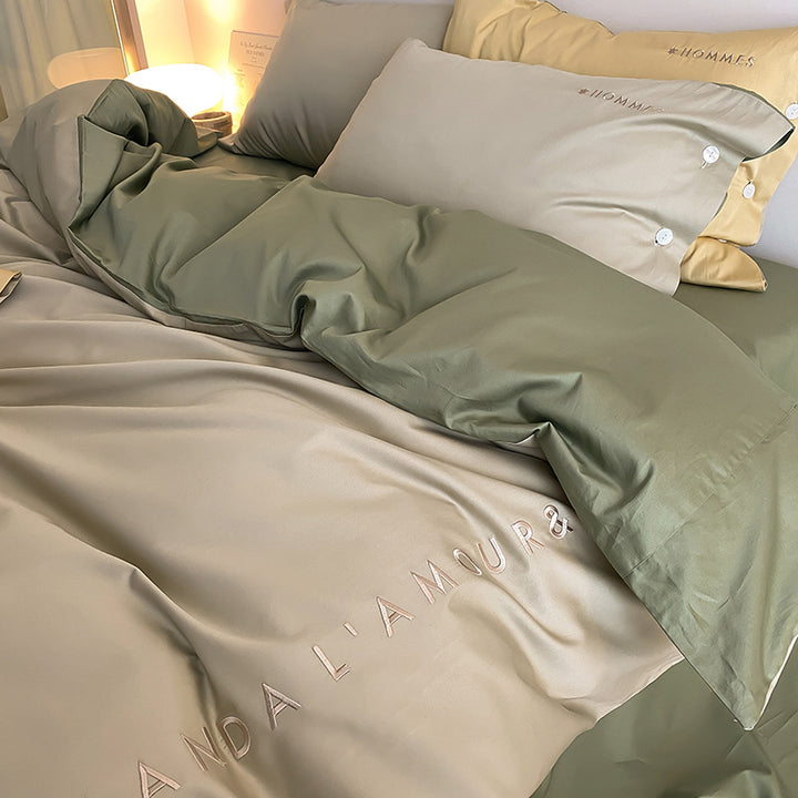 Luxurious cotton satin bedding set with embroidered brand logo and reversible function