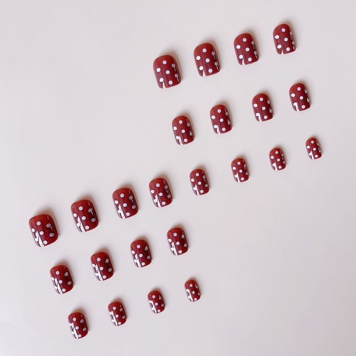 Acrylic nail set with stylish chocolate spots and elegant dots Bowlift