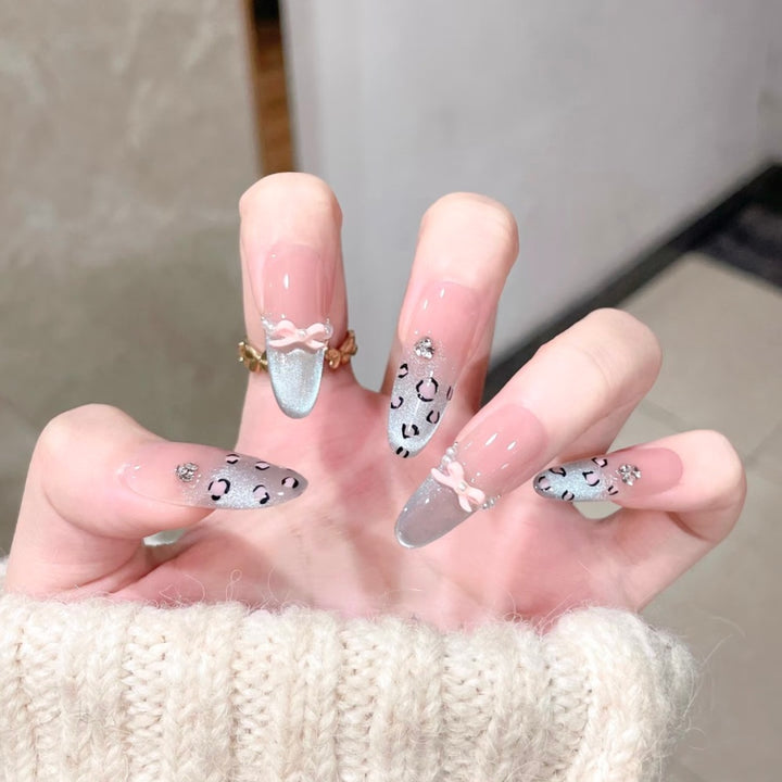 Artistic Stiletto Press-On Nail Set with Leopard Print and Bow Accents Bowlift