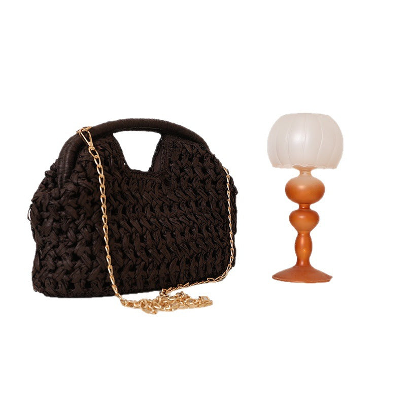 Handcrafted rattan bag with elegant handles and chain straps Bowlift