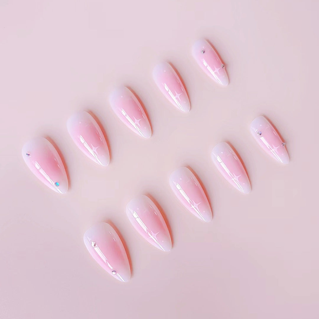 Artificial nail set with romantic heart design and embellished accents Bowlift