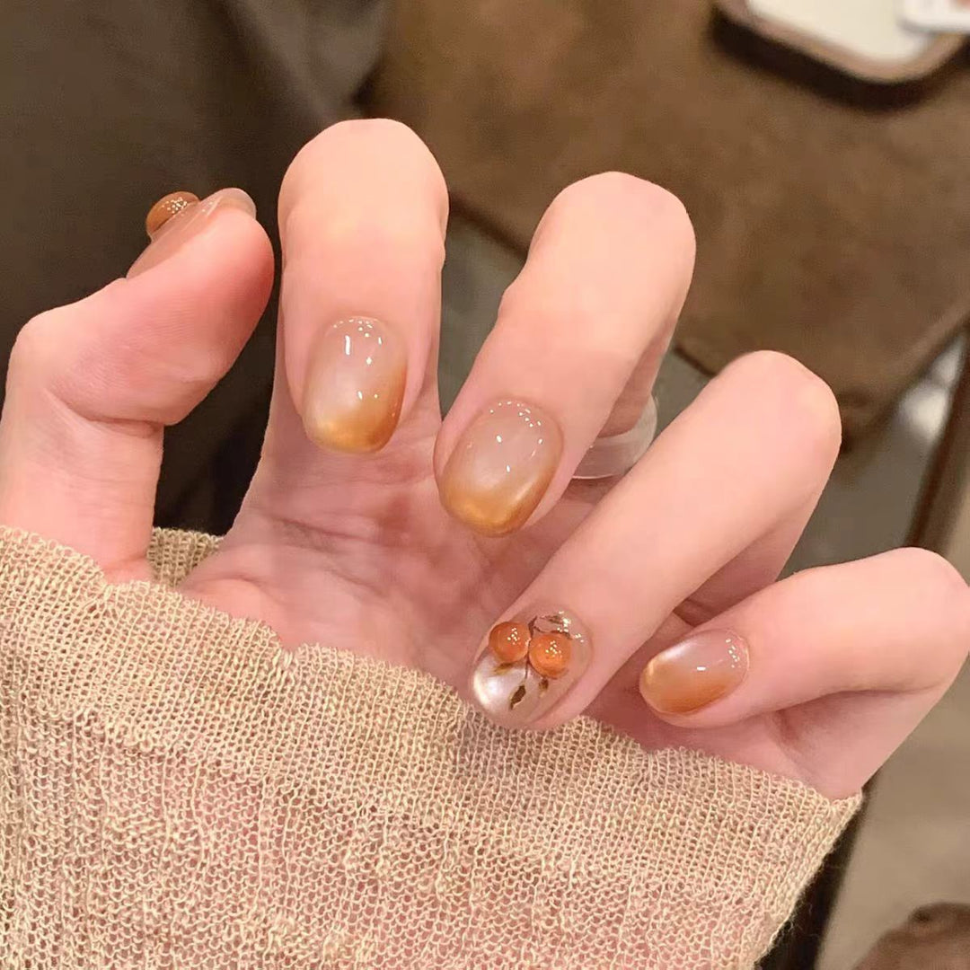 Artificial nails with elegant ombre effect and floral accents Bowlift