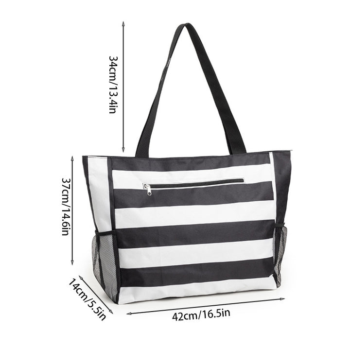 Spacious beach bag with practical outer pockets Bowlift