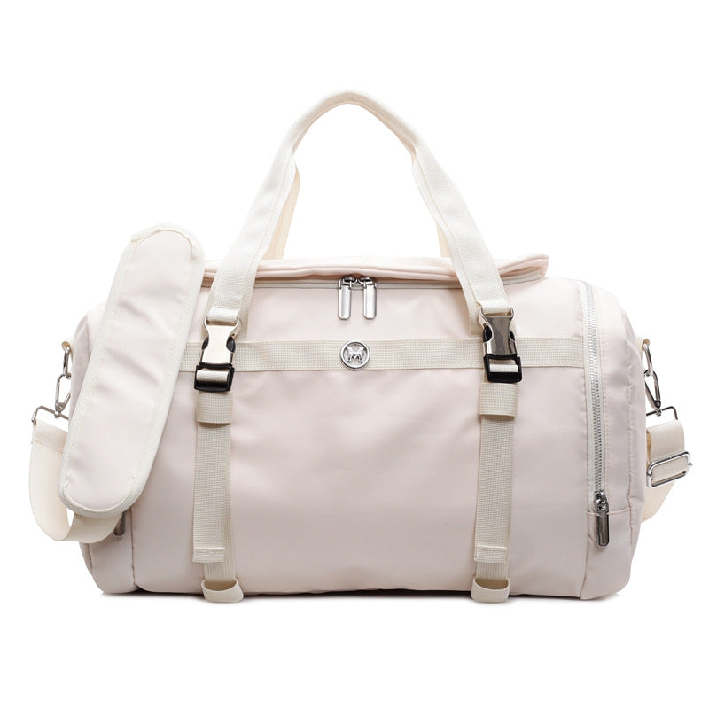 Sporty travel bag with adjustable shoulder strap and several compartments Bowlift