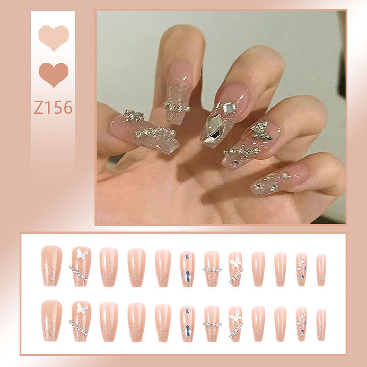 Glamorous artificial nails with sparkling rhinestones and elegant designs Bowlift