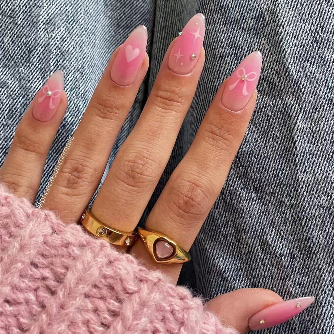 Artificial nail set with romantic heart design and embellished accents Bowlift