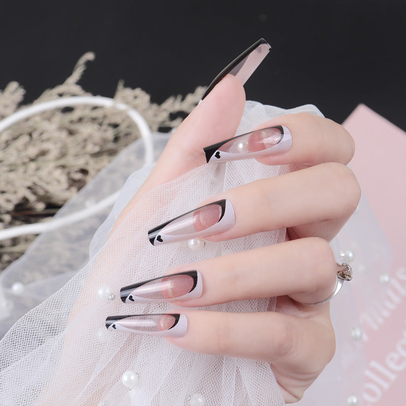 Elegant Stiletto Press-On Nails with Artistic Design Bowlift
