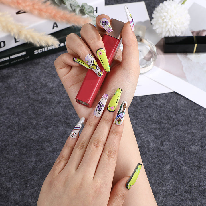 Artificial nails in creative flower design Bowlift
