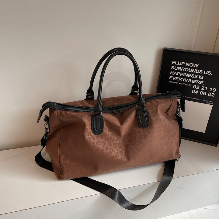 Elegant Travel Bag with Innovative Leopard Print Bowlift