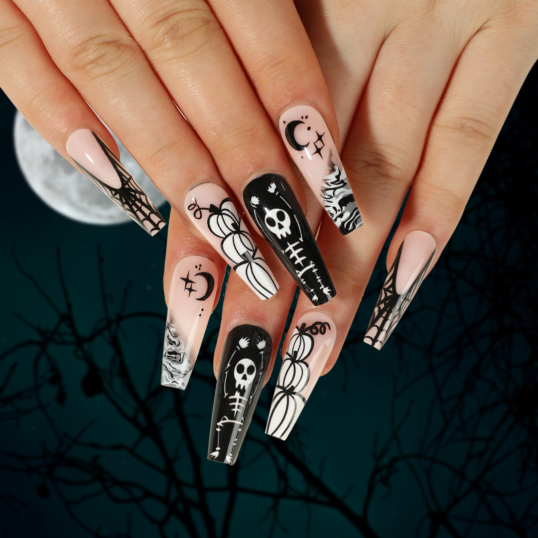 Artificial nail art in Halloween style with graffiti designs Bowlift
