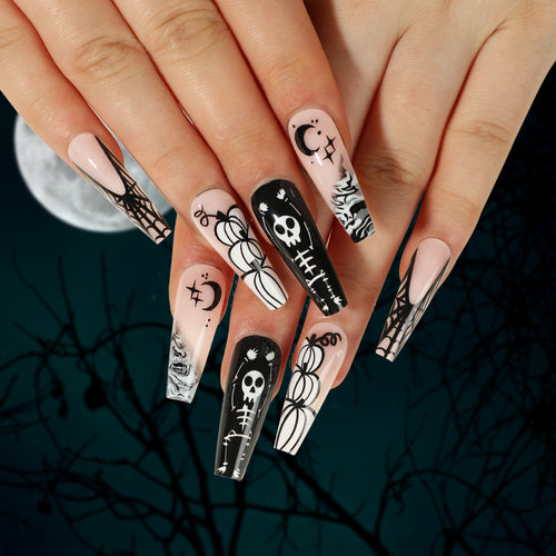 Artificial nail art in Halloween style with graffiti designs Bowlift
