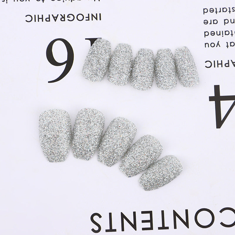 Glittering artificial nails in modern design Bowlift