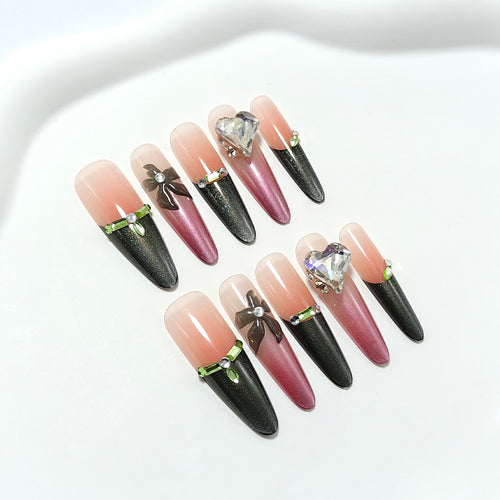 Artificial nails with elegant tip design and glitter accents Bowlift