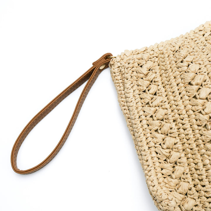 Woven natural material handbag with tassel Bowlift