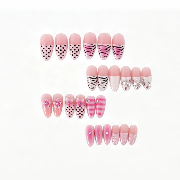 Artistic Press-On Nail Design with Unique Patterns and Rhinestone Accents Bowlift