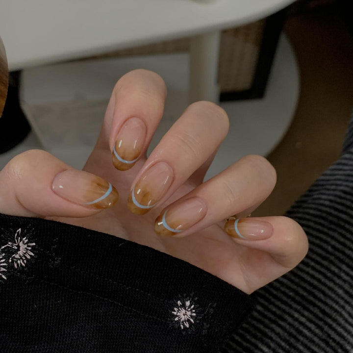 Artificial nails with modern French manicure design Bowlift