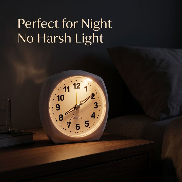 Analog alarm clock with night light and snooze function Bowlift