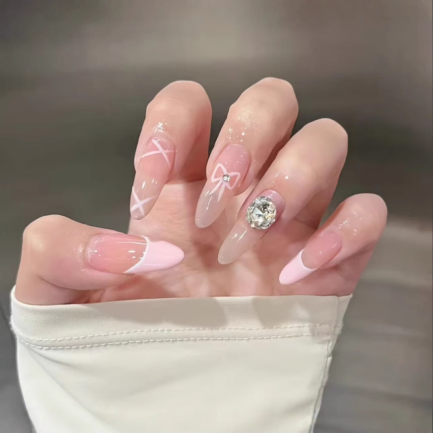 Artistic Press-On Nail Set with Floral and Heart Designs Bowlift