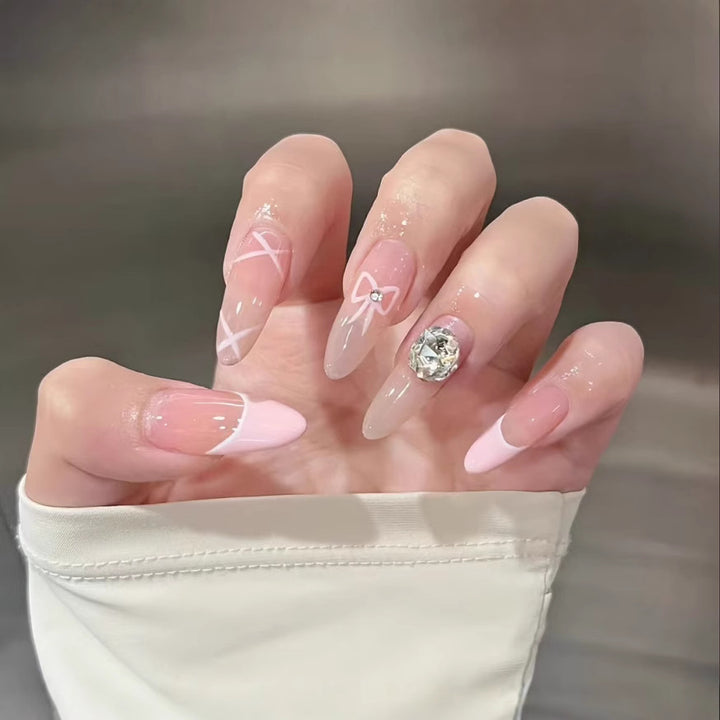 Artistic Press-On Nail Set with Floral and Heart Designs Bowlift