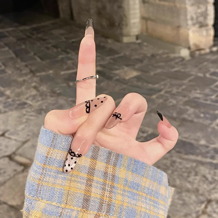 Artistic Press-On Nail Set with Unique Bow and Polka Dot Designs Bowlift