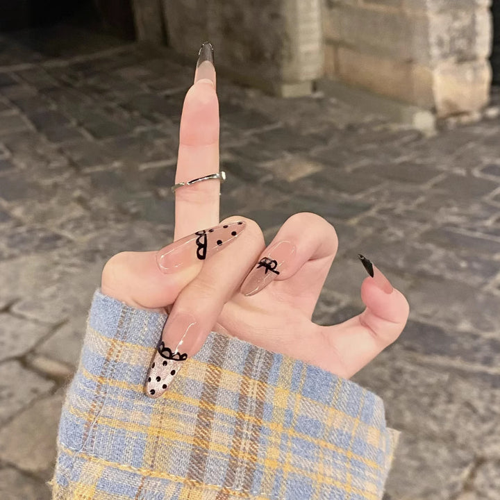 Artistic Press-On Nail Set with Unique Bow and Polka Dot Designs Bowlift