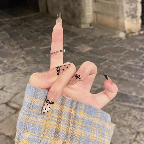 Artistic Press-On Nail Set with Unique Bow and Polka Dot Designs Bowlift