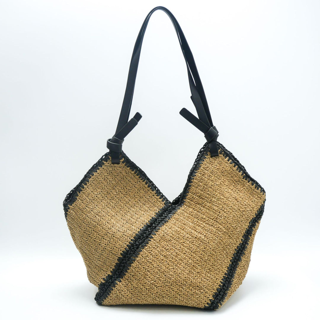 Fashionable beach bag made of woven natural material with leather handles Bowlift
