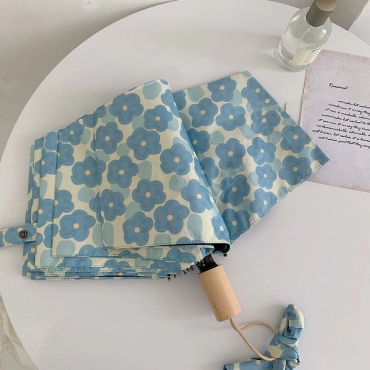 Women Folding Umbrella with Floral Pattern Bowlift