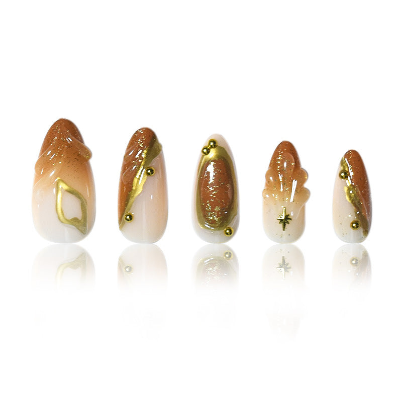 Luxurious Press-On Nail Set with Ornate Gold Detailing Bowlift