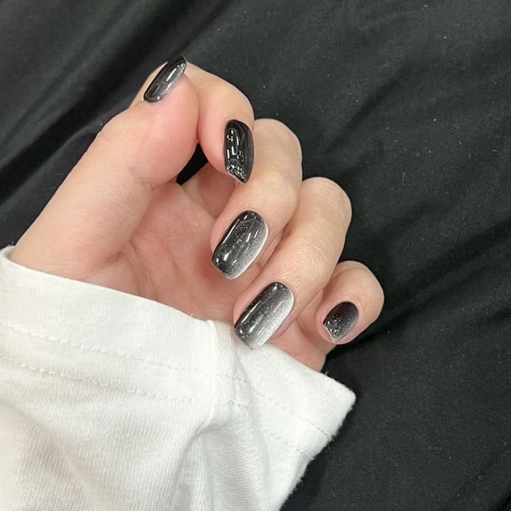 Artifical nail set with glamorous ombre effect and glitter embellishments Bowlift