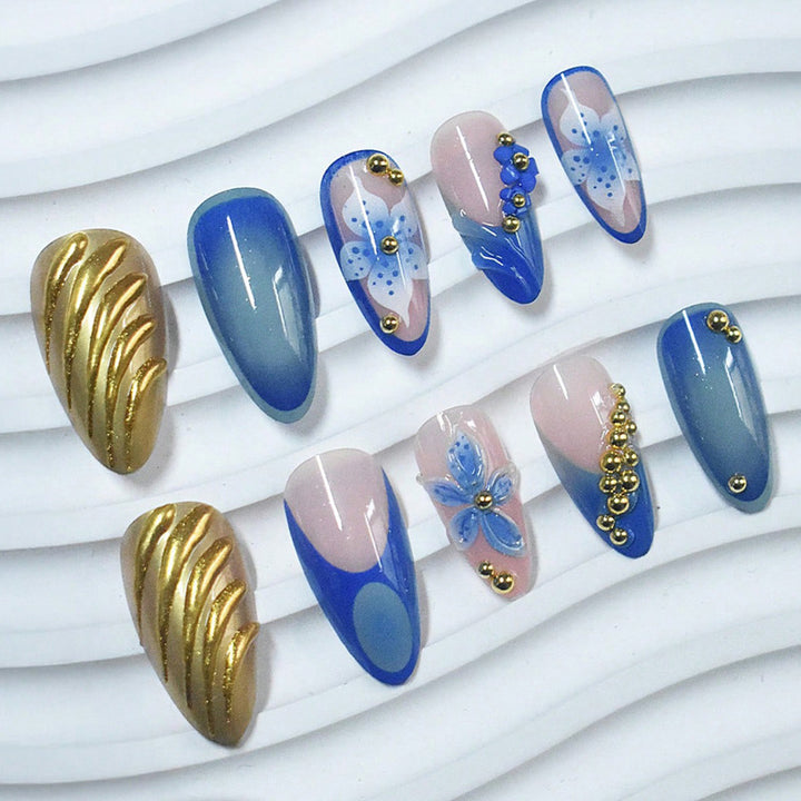 Artistic Press-On Nails with Floral and Metallic Accents Bowlift
