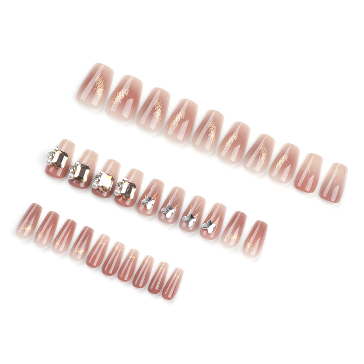 Artificial nail art with elegant jewelry accents Bowlift
