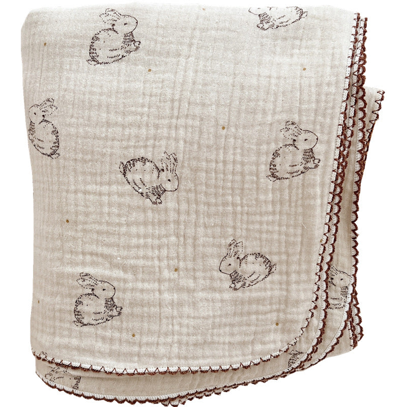 Unisex Muslin Blanket with delicate floral design and elegant ruffles Bowlift