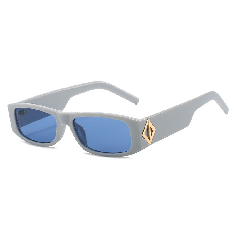 Ladies fashionable sunglasses with asymmetrical frame and gold-colored details Bowlift
