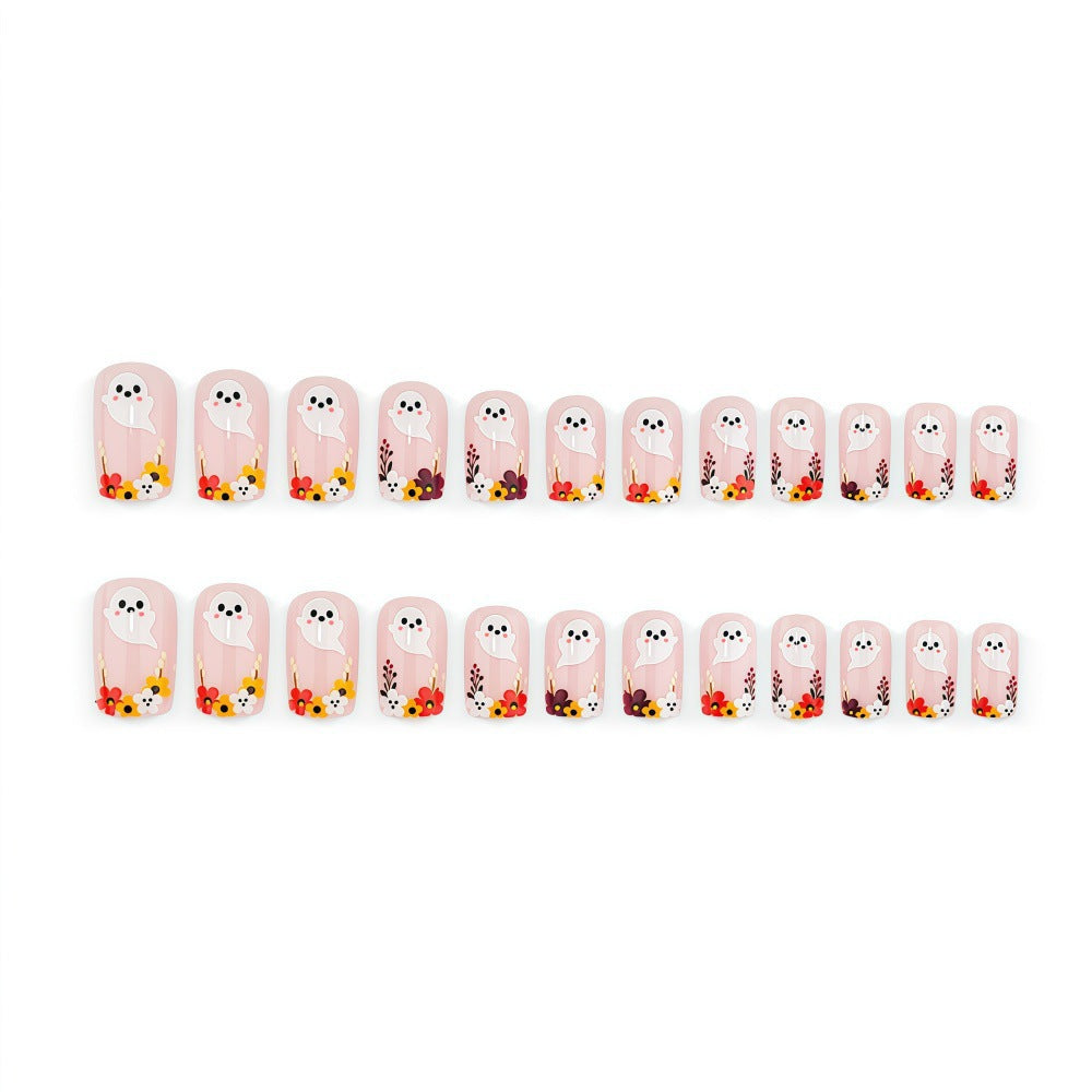 Artificial nails with ghost motif and flower accents Bowlift