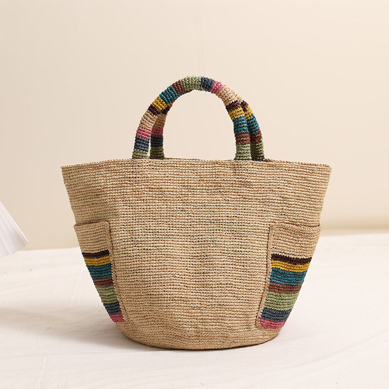Handcrafted basket bag with colorful stripe accents Bowlift