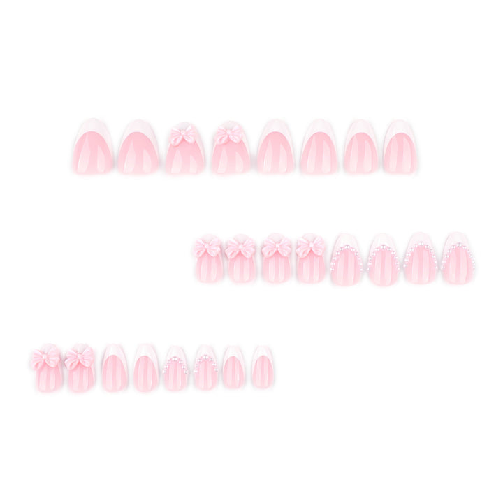 Artful Stiletto Nails with Delicate Bow Accents Bowlift