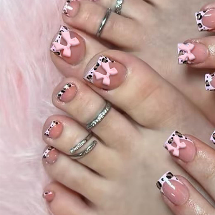 Acrylic nail set with elegant bows and luxurious designs Bowlift