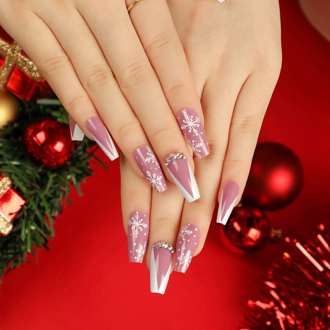 Artistic Nail Extensions with Snowflake Design and Glitter Accents Bowlift