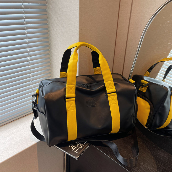 Sporty duffel bag with durable water-repellent material and versatile carrying options Bowlift