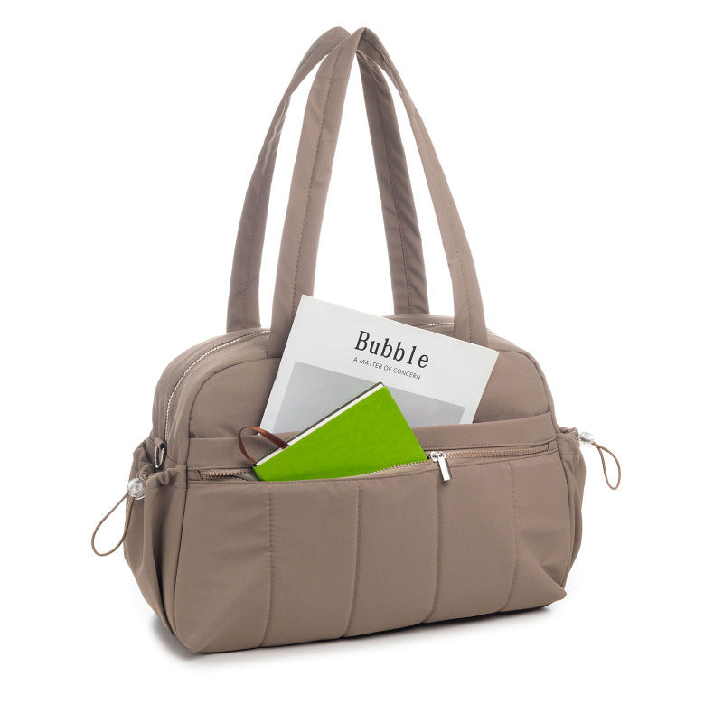 Multifunctional everyday bag with structured interior layout Bowlift