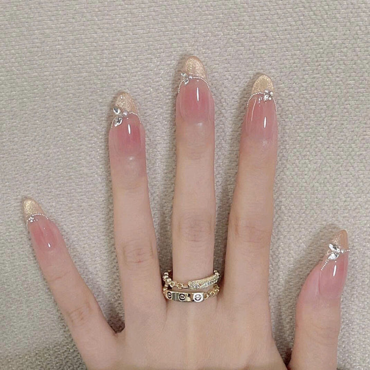 Elegant Stiletto Press-On Nails with Gemstone Accents Bowlift