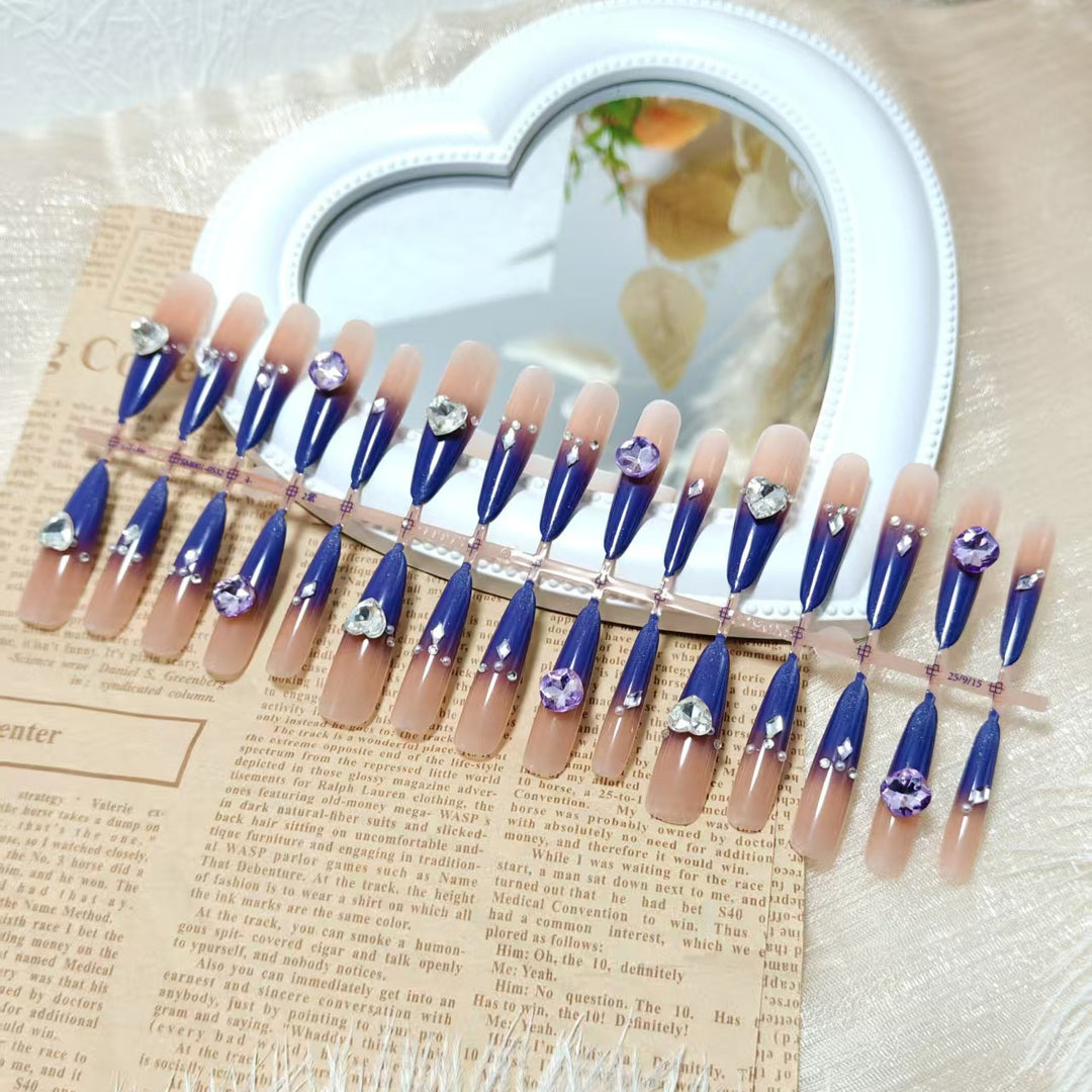 Artificial nails with elegant glitter design and 3D rhinestone accents Bowlift