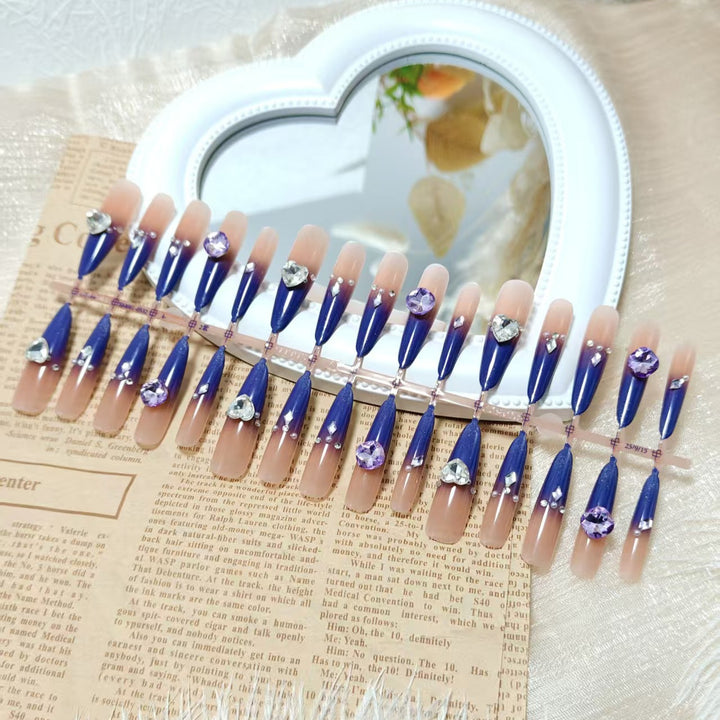 Artificial nails with elegant glitter design and 3D rhinestone accents Bowlift