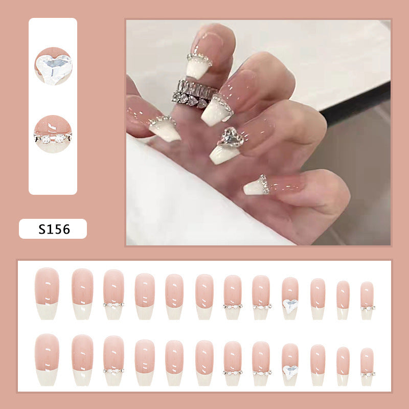 Glamorous artificial nails with rhinestones and elegant contours Bowlift